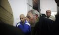 Fidel-Castro-looks-at-an--009